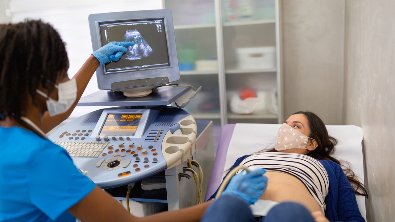 Female doctor doing an ultrasound